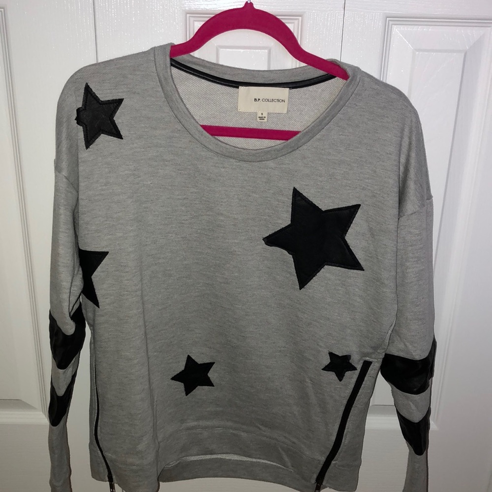 B.P. COLLECTION SWEATER WITH STARS AND ZIPPERS